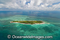 Aerial view of un-inhabited Poll Islet (also known as Guiah and Guijar), a true vegitated coral cay with surrounding coral reef. Torres Strait, Queensland, Australia