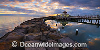 Sunset over the Historic St Kilda Pier and St Kilda Pavilion Kiosk, Port Phillip Bay. Melbourne, Victoria, Australia.