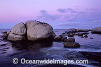 Coastal Seascape. Granite boulder coastline at dusk. False Bay, South Africa