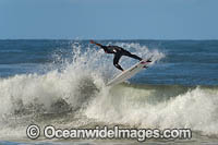 Surfer riding a wave. Sawtell Beach, New South wales, Australia.