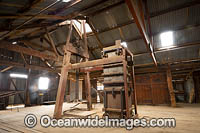 Old wool baling machine inside the historic Kinchega Woolshed, built in 1875. Situated in the outback Central Darling district near Menindee, in Kinchega National Park, New South Wales, Australia