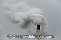 Polluting gas emissions released into the atmosphere from industrial chimney. Northern New South Wales, Australia.