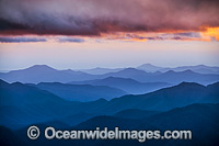 Panorama view of mountains and sunrays at morning sunrise from Point Lookout, on the Great Escarpment situated in Gondwana Rainforest, New England National Park, New South Wales, Australia.