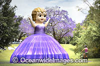 Giant kewpie doll on display in Jacaranda Park during the 2019 Jacaranda Festival. Grafton., New South Wales, Australia. The city of Grafton is the commercial hub of the Clarence River Valley, known as Jacaranda City.