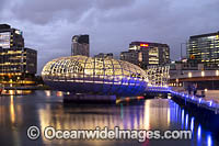 Web Bridge after sunset, a foot bridge that crosses the Yarra River at Docklands. Melbourne City, Victoria, Australia.