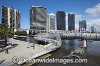 Web Bridge, a foot bridge that crosses the Yarra River at Docklands. Melbourne City, Victoria, Australia.