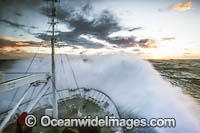 Big wave breaking over the bow of ship, in Drake Passage. Antarctica.