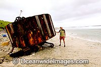 Vagrant mooring block, washed ashore by tidal movement on a remote tropical island beach. Cocos (Keeling) Islands, Indian Ocean, Australia
