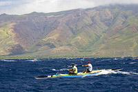Two man paddle team in the Maui Canoe and Kayak Club's 2014 Maui to Molokai race from DT Fleming Beach to Kaunakakai Harbor, Hawaii.