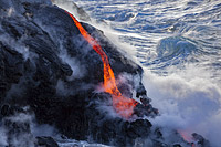 The Pahoehoe lava flowing from Kilauea Volcano has reached the Pacific Ocean near Kalapana, Big Island, Hawaii, Pacific Ocean, USA.