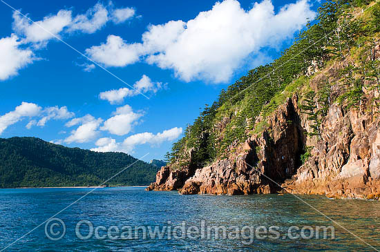 Spectacular rocky coastline at Hayman Island, showing Hook Island in the background. Whitsunday Islands, Queensland, Australia Photo - Gary Bell Spectacular rocky coastline at Hayman Island, showing Hook Island in the background. Whitsunday Islands, Queensland, Australia Photo - Gary Bell