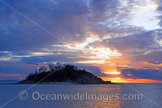 Seascape comprising tropical island and sunset. Whitsunday Islands, Queensland, Australia Photo - Gary Bell Seascape comprising tropical island and sunset. Whitsunday Islands, Queensland, Australia Photo - Gary Bell
