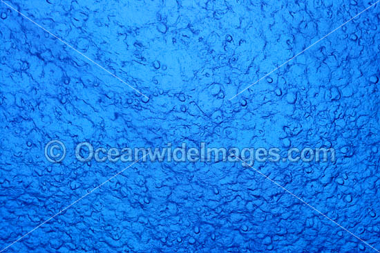 Ocean surface rain droplets photo