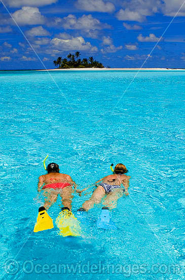 Snorkelers at tropical Island photo Snorkelers at tropical Island photo
