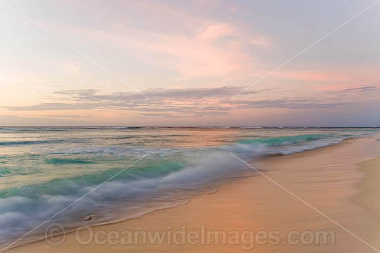 Tropical beach scene at dusk. Cocos (Keeling) Islands, Indian Ocean, Australia Photo - Gary Bell Tropical beach scene at dusk. Cocos (Keeling) Islands, Indian Ocean, Australia Photo - Gary Bell