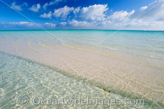 Tidal ripples breaking over a tropical beach sand bar. Cocos (Keeling) Islands, Indian Ocean, Australia Photo - Gary Bell Tidal ripples breaking over a tropical beach sand bar. Cocos (Keeling) Islands, Indian Ocean, Australia Photo - Gary Bell