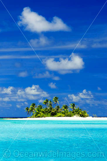 Idyllic tropical island setting, comprising coconut palm fringed island surrounded by crystal lagoon water. Cocos (Keeling) Islands, Indian Ocean, Australia Photo - Gary Bell Idyllic tropical island setting, comprising coconut palm fringed island surrounded by crystal lagoon water. Cocos (Keeling) Islands, Indian Ocean, Australia Photo - Gary Bell