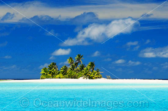 Tropical island setting, comprising coconut palm fringed island surrounded by crystal lagoon water. Cocos (Keeling) Islands, Indian Ocean, Australia Photo - Gary Bell Tropical island setting, comprising coconut palm fringed island surrounded by crystal lagoon water. Cocos (Keeling) Islands, Indian Ocean, Australia Photo - Gary Bell