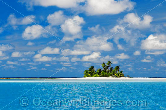 Tropical island setting, comprising coconut palm fringed island surrounded by crystal lagoon water. Cocos (Keeling) Islands, Indian Ocean, Australia Photo - Gary Bell Tropical island setting, comprising coconut palm fringed island surrounded by crystal lagoon water. Cocos (Keeling) Islands, Indian Ocean, Australia Photo - Gary Bell