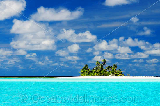 Tropical island setting, comprising coconut palm fringed island surrounded by crystal lagoon water. Cocos (Keeling) Islands, Indian Ocean, Australia Photo - Gary Bell Tropical island setting, comprising coconut palm fringed island surrounded by crystal lagoon water. Cocos (Keeling) Islands, Indian Ocean, Australia Photo - Gary Bell