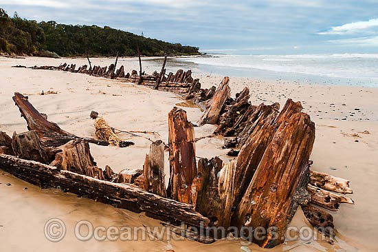 Historic Shipwreck 'Buster' on Woolgoolga beach, New South Wales. Vessel was blown ashore & beached during a violent storm in Feb 1893. Class: Barquentine. Construction: Timber single deck & 3 masts. Built: Nova Scotia, Canada 1884. Length - 129 ft Photo - Gary Bell