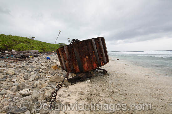 Vagrant mooring block, washed ashore by tidal movement on a remote tropical island beach. Cocos (Keeling) Islands, Indian Ocean, Australia Photo - Inger Vandyke Vagrant mooring block, washed ashore by tidal movement on a remote tropical island beach. Cocos (Keeling) Islands, Indian Ocean, Australia Photo - Inger Vandyke