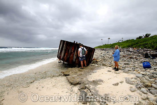 Vagrant mooring block, washed ashore by tidal movement on a remote tropical island beach. Cocos (Keeling) Islands, Indian Ocean, Australia Photo - Inger Vandyke Vagrant mooring block, washed ashore by tidal movement on a remote tropical island beach. Cocos (Keeling) Islands, Indian Ocean, Australia Photo - Inger Vandyke