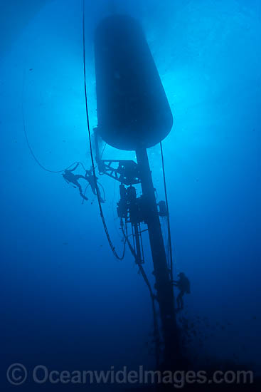 Diver installing Wave Energy Buoy photo