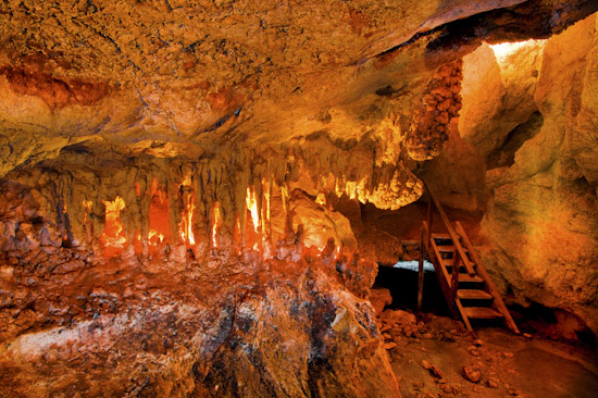 Capricorn Caves, showing a limestone cavern with stalagtites and stalagmites, known as Capricorn Caves, showing a limestone cavern with stalagtites and stalagmites, known as