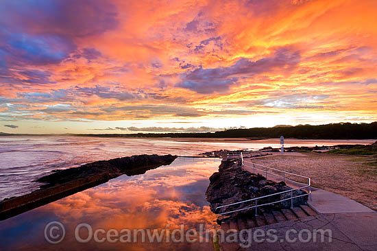 Sawtell Rock Pool at dusk with a blazing sunset. Sawtell, New South Wales, Australia Photo - Gary Bell