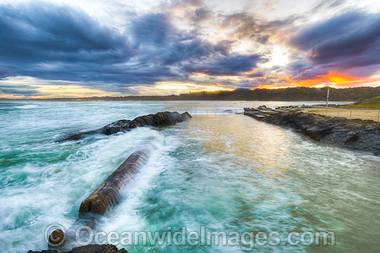 Sawtell Rock Pool at sunset. A favourite natural rock swimming pool open to the general public. Sawtell, New South Wales, Australia. Photo - Gary Bell Sawtell Rock Pool at sunset. A favourite natural rock swimming pool open to the general public. Sawtell, New South Wales, Australia. Photo - Gary Bell