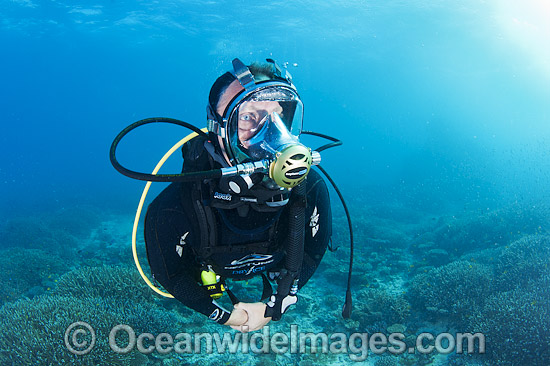 Diver wearing communications mask photo