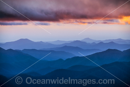 Panorama view of mountains and sunrays at morning sunrise from Point Lookout, on the Great Escarpment situated in Gondwana Rainforest, New England National Park, New South Wales, Australia. Photo - Gary Bell
