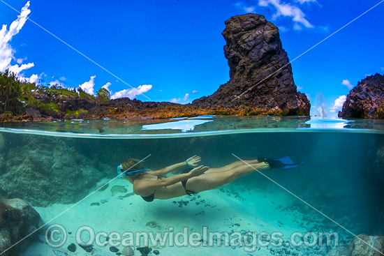 Snorkel diver exploring a tidal rock pool at Christmas Island, Indian Ocean, Australia. Photo - Gary Bell Snorkel diver exploring a tidal rock pool at Christmas Island, Indian Ocean, Australia. Photo - Gary Bell