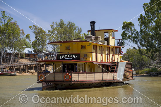 Historic wood fired paddlesteamer, PS Emmylou, cruising down the Murray River at Echuca with historic wharf in background, Victoria, Australia. Photo - Gary Bell Historic wood fired paddlesteamer, PS Emmylou, cruising down the Murray River at Echuca with historic wharf in background, Victoria, Australia. Photo - Gary Bell