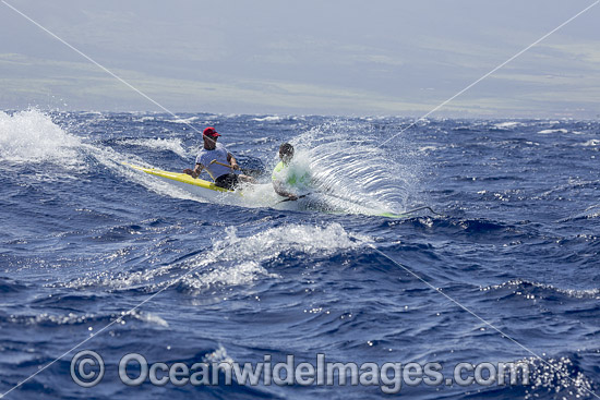 Two man paddle team in the Maui Canoe and Kayak Club's 2024 Maui to Molokai race from DT Fleming Beach to Kaunakakai Harbor, Hawaii. Photo - David Fleetham