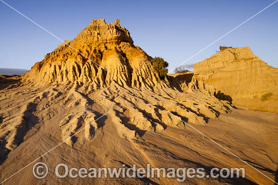 Sunset picture of eroded sand and mud dunes, known as 'Walls of China', situated on the fringe of Lake Mungo. Mungo World Heritage National Park, south-western New South Wales, Australia Photo - Gary Bell Sunset picture of eroded sand and mud dunes, known as 'Walls of China', situated on the fringe of Lake Mungo. Mungo World Heritage National Park, south-western New South Wales, Australia Photo - Gary Bell