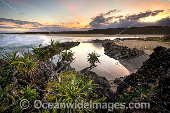 Sawtell Rock Pool at sunset. A tidal rock swimming pool at Sawtell Headland that is open to the public. Sawtell, New South Wales, Australia. Photo - Gary Bell