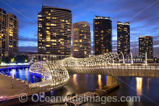 Web Bridge after sunset, a foot bridge that crosses the Yarra River at Docklands. Melbourne City, Victoria, Australia. Photo - Gary Bell