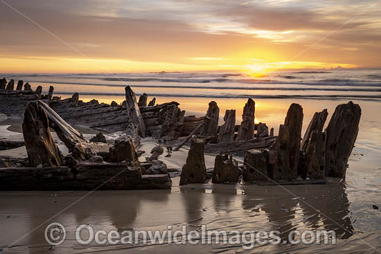 Historic Shipwreck 'Buster' on Woolgoolga beach, New South Wales. Vessel was blown ashore & beached during a violent storm in Feb 1893. Class: Barquentine. Construction: Timber single deck & 3 masts. Built: Nova Scotia, Canada 1884. Length - 129 ft. Photo - Gary Bell Historic Shipwreck 'Buster' on Woolgoolga beach, New South Wales. Vessel was blown ashore & beached during a violent storm in Feb 1893. Class: Barquentine. Construction: Timber single deck & 3 masts. Built: Nova Scotia, Canada 1884. Length - 129 ft. Photo - Gary Bell