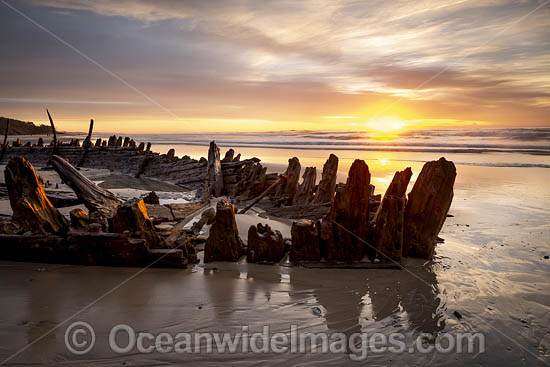 Historic Shipwreck 'Buster' on Woolgoolga beach, New South Wales. Vessel was blown ashore & beached during a violent storm in Feb 1893. Class: Barquentine. Construction: Timber single deck & 3 masts. Built: Nova Scotia, Canada 1884. Length - 129 ft. Photo - Gary Bell Historic Shipwreck 'Buster' on Woolgoolga beach, New South Wales. Vessel was blown ashore & beached during a violent storm in Feb 1893. Class: Barquentine. Construction: Timber single deck & 3 masts. Built: Nova Scotia, Canada 1884. Length - 129 ft. Photo - Gary Bell