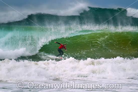 Surfer riding a wave. Sawtell Beach, New South wales, Australia. Photo - Gary Bell