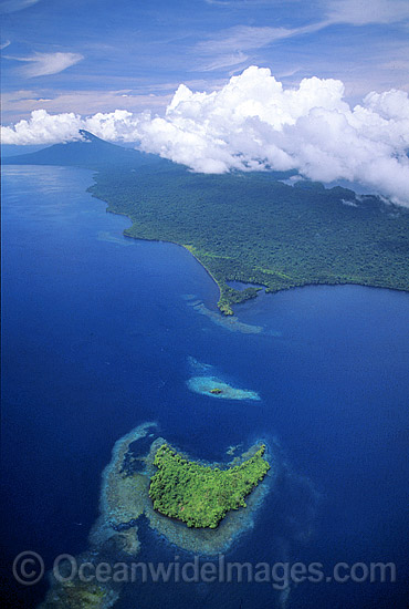 Aerial view of coastal islands and fringing Coral reefs. New Britain Island south coast, Papua New Guinea Photo - Gary Bell