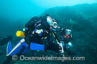 Underwater photographer and technical scuba diver, diving with a rebreather device at the Solitary Islands, Coffs Harbour, New South Wales, Australia