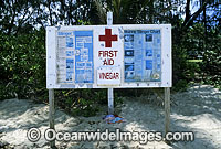First Aid and dangerous Jellyfish warning sign erected on tropical beach. Port Douglas, North Queensland, Australia