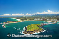 Aerial view of Coffs Harbour, situated on the northern New South Wales coast, showing Mutton Bird Island, protected boat harbour with jetty, Coffs Harbour township and mountain range. Coffs Harbour, Australia.