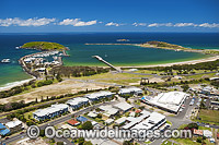 Aerial view of Coffs Harbour, situated on the northern New South Wales coast, showing protected boat harbour, Mutton Bird Island, jetty and foreshore. Coffs Harbour, Australia.