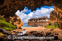 View from inside Loch Ard Gorge Cave looking out to Loch Ard Gorge, where shipwreck survivors Tom Pearce and Eva Carmichael swam ashore in June, 1878. Port Campbell Coastal National Park, Victoria, Australia.