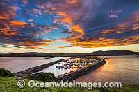 Sunset over Coffs Harbour and marina, taken from Mutton Bird Island. Coffs Harbour, New South Wales, Australia.
