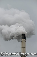 Polluting gas emissions released into the atmosphere from industrial chimney. Northern New South Wales, Australia.